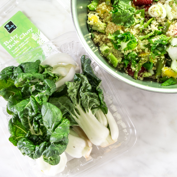 A package of baby bok choy and a bowl of a bok choy salad.