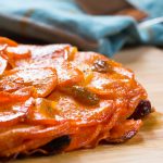 Sweet Potatoes Anna layered with apples and golden raisins.