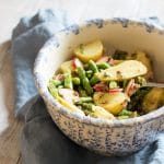 Potato salad with asparagus, radishes and lentils.