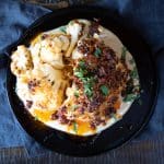 Whole roasted cauliflower, with tahini sauce and smokey paprika dressing.