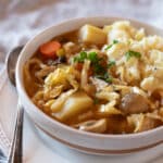 Irish stew of potatoes, cabbage, onions and carrots with colcannon mashed potatoes.