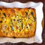 Chile rellenos casserole with eggs fresh from the oven in a baking dish.