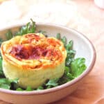 Herbed goat cheese soufflé on a plate.