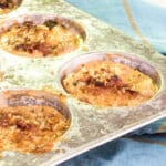 Mini potato gratins in a muffin pan.
