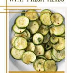 A bowl of sautéed sliced zucchini with herbs with text overlay.